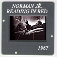 Reading in bed: CLICK TO VIEW PHOTOGRAPH